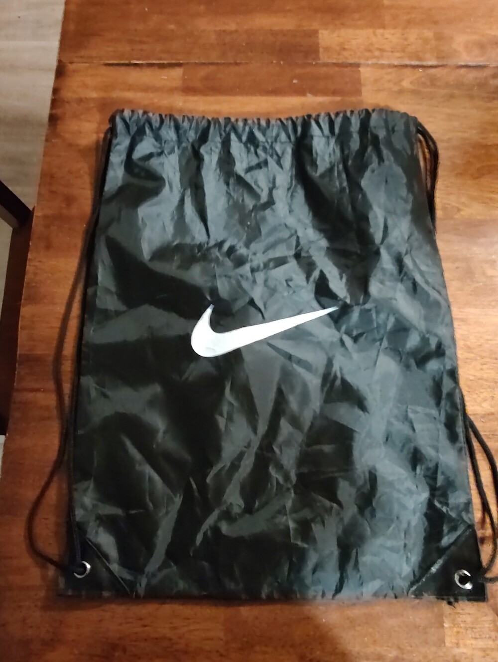 Nike Black Drawstring Backpack with White Swoosh